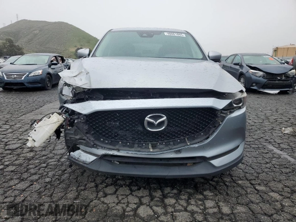 2017 Mazda CX-5 Touring with VIN JM3KFACL9H0183937, listed as a Copart auction lot 48861865 with 91,268 mi miles and Salvage Title. Bid and sale history available at carsss.com. Image 5.