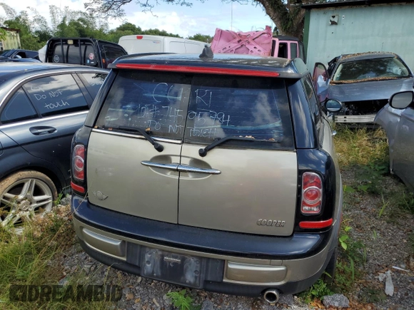 2011 MINI Clubman z VIN WMWZF3C56BTY00475, wystawiony jako Copart lot #74595784 z przebiegiem Nie podano mil oraz Nie do naprawy • Non repairable. Historia ofert i sprzedaży dostępna na DreamBid. Obrazek 6.