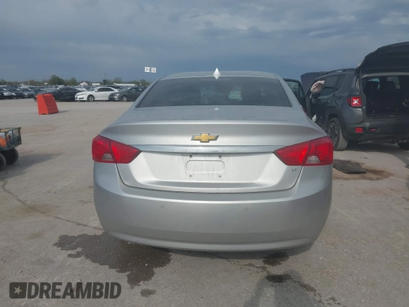 2014 Chevrolet Impala LT with VIN 2G1125S39E9313542, listed as a IAAI auction lot 41988420 with 227,093 mi miles and . Bid and sale history available at DreamBid. Image 16.