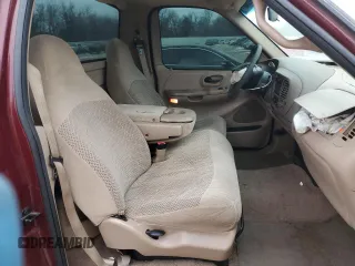 1999 Ford F-150 with VIN 1FTRF17W1XKB48291, listed as a Copart auction lot 45526035 with 154,699 mi miles and Salvage title. Bid and sale history available at DreamBid. Image 10.