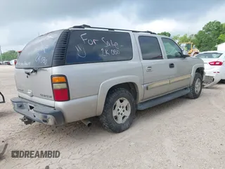 2004 Chevrolet Suburban LT with VIN 1GNEC16Z34J268718, listed as a IAAI auction lot 42078372 with 433,488 mi miles and . Bid and sale history available at DreamBid. Image 4.
