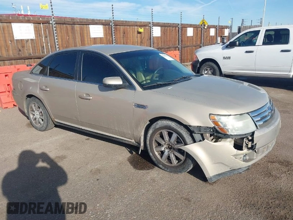 2008 Ford Taurus SEL with VIN 1FAHP24W38G111319, listed as a IAAI auction lot 41585092 with 216,419 mi miles. Bid and sale history available at carsss.com. Image 1.