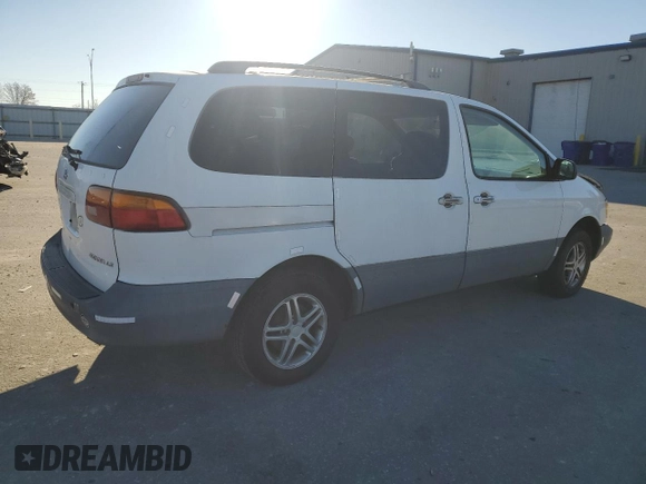 2000 Toyota Sienna LE with VIN 4T3ZF13C5YU201708, listed as a Copart auction lot 83924024 with 219,940 mi miles and Salvage Title. Bid and sale history available at DreamBid. Image 3.