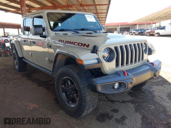 2022 Jeep Gladiator Rubicon with VIN 1C6JJTBG2NL164117, listed as a IAAI auction lot 42450350 with 22,326 mi miles and . Bid and sale history available at DreamBid. Image 1.