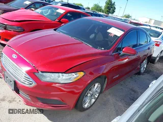 2017 Ford Fusion Hybrid SE with VIN 3FA6P0LU7HR317604, listed as a IAAI auction lot 42713039 with 302,322 mi miles and . Bid and sale history available at DreamBid. Image 2.