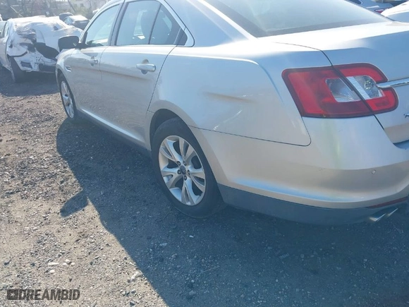 2010 Ford Taurus SEL with VIN 1FAHP2EW2AG107489, listed as a IAAI auction lot 39206067 with 128135 miles. Bid and sale history available at carsss.com. Image 6.