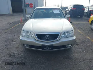 2004 Acura RL w/Navigation System z VIN JH4KA96664C001291, wystawiony jako IAAI lot #41678449 z przebiegiem 83 954 mil mil oraz . Historia ofert i sprzedaży dostępna na DreamBid. Obrazek 6.