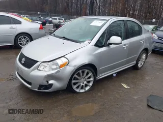 2011 Suzuki SX4 with VIN JS2YC5A41B6300385, listed as a IAAI auction lot 41570810 with 117,847 mi miles and . Bid and sale history available at DreamBid. Image 2.