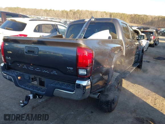 2018 Toyota Tacoma SR with VIN 5TFCZ5AN7JX154112, listed as a IAAI auction lot 41394058 with 158,045 mi miles. Bid and sale history available at carsss.com. Image 4.