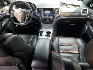 2015 Jeep Grand Cherokee High Altitude с VIN 1C4RJFCG2FC213054, выставлен на аукционе Copart как лот 59145225 с пробегом 132 880 миль миль и Списание • Salvage title. История ставок и продаж доступна на DreamBid. Изображение 8.