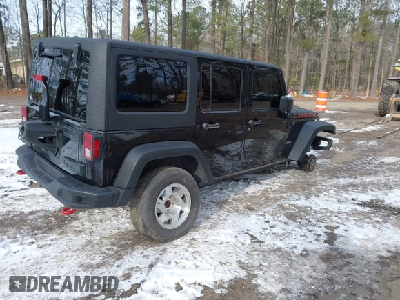 2017 Jeep Wrangler Unlimited Rubicon Recon z VIN 1C4BJWFG4HL723096, wystawiony jako IAAI lot #41393584 z przebiegiem 102 045 mil mil oraz . Historia ofert i sprzedaży dostępna na DreamBid. Obrazek 4.