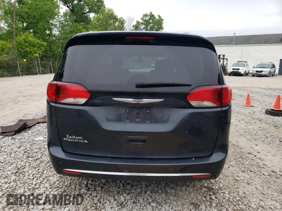 2020 Chrysler Pacifica Touring L with VIN 2C4RC1BG0LR182341, listed as a Copart auction lot 58519235 with 80,212 mi miles and Salvage title. Bid and sale history available at DreamBid. Image 6.
