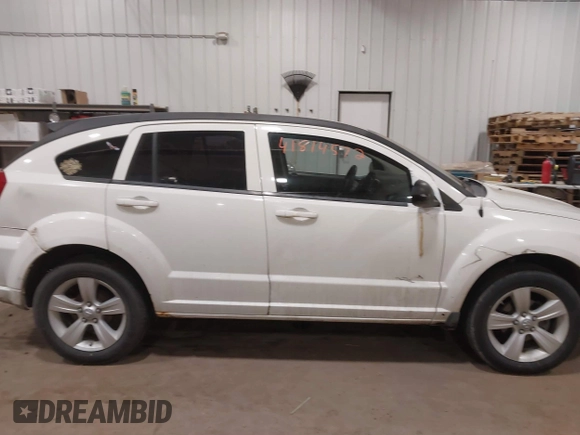 2010 Dodge Caliber SXT with VIN 1B3CB4HA3AD590654, listed as a IAAI auction lot 41814572 with 203,422 mi miles and . Bid and sale history available at DreamBid. Image 14.