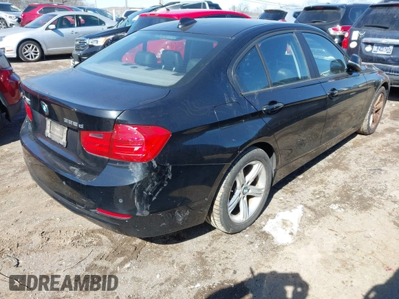 2014 BMW 3 Series 328d xDrive with VIN WBA3D5C54EF147199, listed as a IAAI auction lot 41626737 with 98,281 mi miles. Bid and sale history available at carsss.com. Image 4.