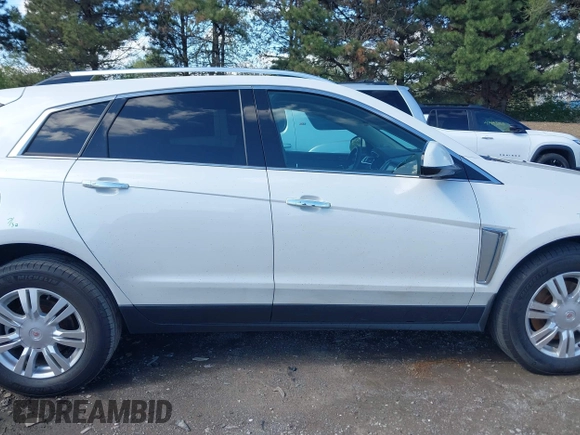 2014 Cadillac SRX Luxury Collection with VIN 3GYFNBE35ES581743, listed as a IAAI auction lot 41995293 with 140,987 mi miles. Bid and sale history available at carsss.com. Image 14.