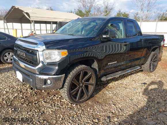 2014 Toyota Tundra 2WD Truck SR with VIN 5TFRM5F1XEX074579, listed as a IAAI auction lot 41540661 with 132,505 mi miles. Bid and sale history available at carsss.com. Image 2.