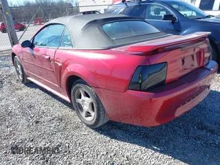 2004 Ford Mustang Deluxe with VIN 1FAFP44694F219365, listed as a IAAI auction lot 41628448 with 124,733 mi miles. Bid and sale history available at carsss.com. Image 3.