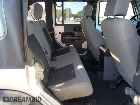 2008 Jeep Wrangler Unlimited X with VIN 1J4GB39138L517920, listed as a Copart auction lot 76541144 with 213,002 mi miles and Salvage Title. Bid and sale history available at DreamBid. Image 10.