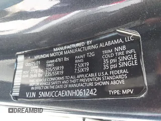 2022 Hyundai Tucson SEL with VIN 5NMJCCAEXNH061242, listed as a IAAI auction lot 41866145 with 63,501 mi miles and . Bid and sale history available at carsss.com. Image 9.