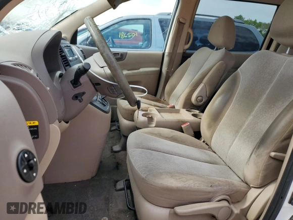 2012 Kia Sedona LX with VIN KNDMG4C70C6463772, listed as a Copart auction lot 63697464 with 72,637 mi miles and Salvage Title. Bid and sale history available at carsss.com. Image 7.