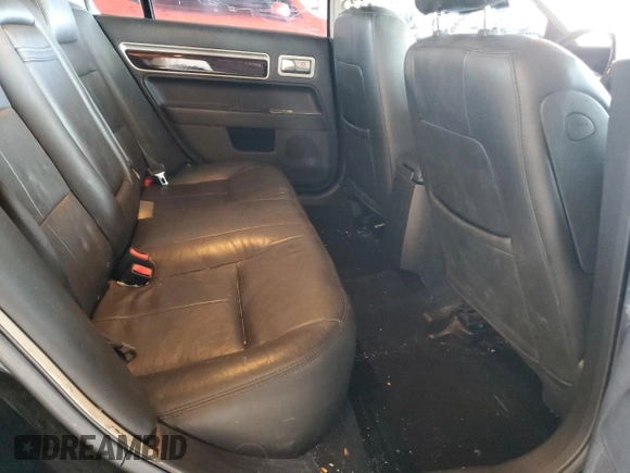 2008 Lincoln MKZ z VIN 3LNHM26TX8R646805, wystawiony jako Copart lot #57482325 z przebiegiem 124 200 mil mil oraz Szkoda całkowita • Salvage title. Historia ofert i sprzedaży dostępna na DreamBid. Obrazek 10.
