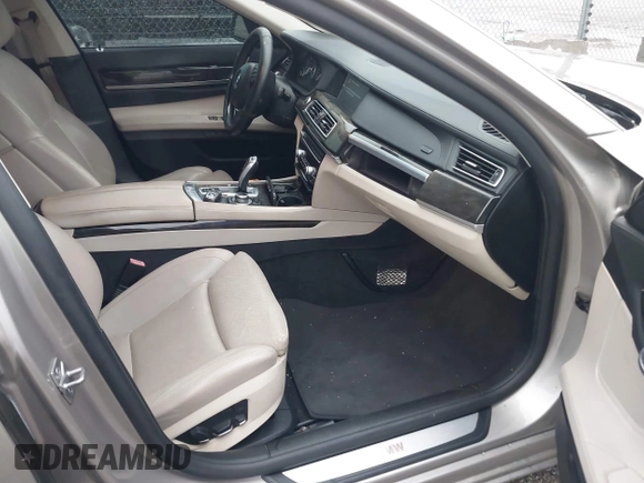 2012 BMW 7 Series 750i with VIN WBAKA8C50CDX01319, listed as a IAAI auction lot 42133359 with 168,986 mi miles and . Bid and sale history available at DreamBid. Image 5.