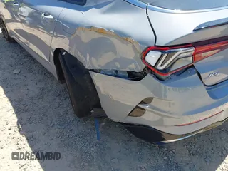 2022 Kia K5 GT-Line z VIN 5XXG64J23NG156401, wystawiony jako IAAI lot #42051123 z przebiegiem 71 853 mil mil oraz . Historia ofert i sprzedaży dostępna na DreamBid. Obrazek 18.