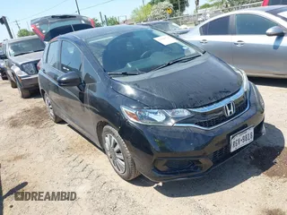 2019 Honda Fit LX z VIN 3HGGK5H45KM753568, wystawiony jako IAAI lot #42004174 z przebiegiem 96 406 mil mil oraz . Historia ofert i sprzedaży dostępna na DreamBid. Obrazek 1.