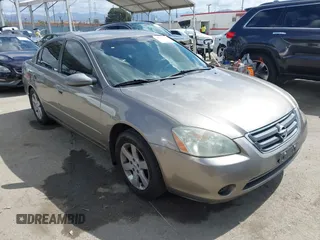 2003 Nissan Altima S z VIN 1N4AL11DX3C345743, wystawiony jako IAAI lot #42256493 z przebiegiem 92 251 mil mil oraz . Historia ofert i sprzedaży dostępna na DreamBid. Obrazek 1.