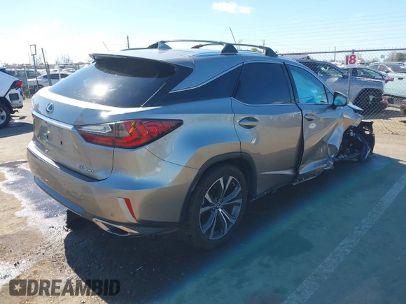 2018 Lexus RX 350 z VIN 2T2BZMCA7JC140852, wystawiony jako IAAI lot #41669823 z przebiegiem 56 306 mil mil oraz . Historia ofert i sprzedaży dostępna na DreamBid. Obrazek 4.