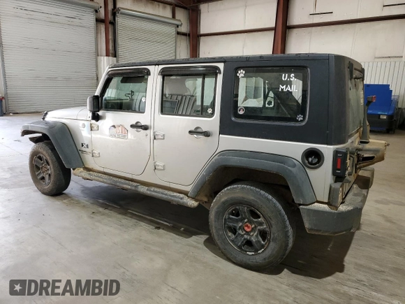 2009 Jeep Wrangler Unlimited X with VIN 1J4GZ39159L711944, listed as a Copart auction lot 50406045 with 211,099 mi miles and Clean Title. Bid and sale history available at carsss.com. Image 2.