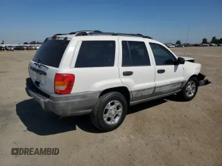 1999 Jeep Grand Cherokee Laredo с VIN 1J4G258S8XC735159, выставлен на аукционе Copart как лот 56247505 с пробегом 241 636 миль миль и Списание • Salvage title. История ставок и продаж доступна на DreamBid. Изображение 3.