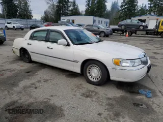2001 Lincoln Town Car Executive z VIN 1LNHM81W91Y729914, wystawiony jako Copart lot #41593085 z przebiegiem 144 950 mil mil oraz Czysty tytuł • Clean title. Historia ofert i sprzedaży dostępna na DreamBid. Obrazek 4.