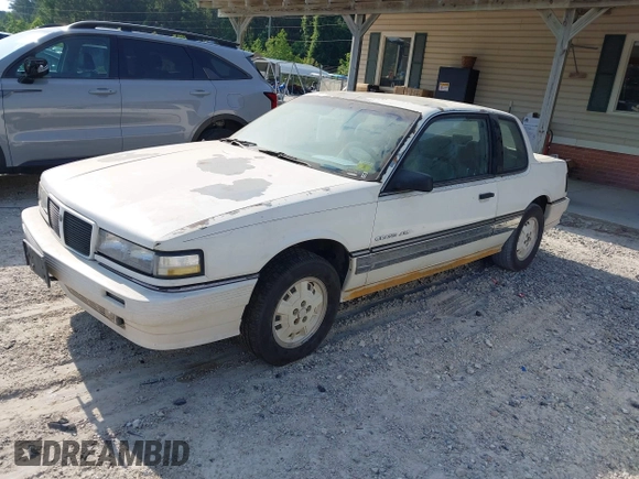 1986 Pontiac Grand Am with VIN 1G2NW27L1GC723322, listed as a IAAI auction lot 42290581 with Not provided miles and . Bid and sale history available at DreamBid. Image 2.