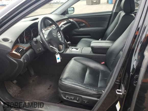 2006 Acura RL with VIN JH4KB16576C003138, listed as a Copart auction lot 52933995 with 176,906 mi miles and Salvage Title. Bid and sale history available at DreamBid. Image 7.