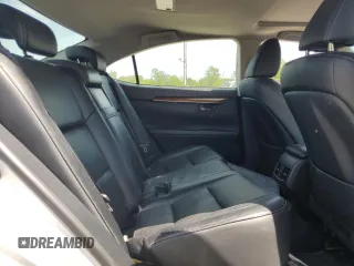 2014 Lexus ES 300h z VIN JTHBW1GG5E2051021, wystawiony jako Copart lot #56654705 z przebiegiem Nie podano mil oraz Szkoda całkowita • Salvage title. Historia ofert i sprzedaży dostępna na DreamBid. Obrazek 10.