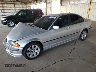 1999 BMW 3 Series 323i with VIN WBAAM3333XFP53266, listed as a Copart auction lot 76636154 with 87,179 mi miles and Salvage Title. Bid and sale history available at carsss.com. Image 1.
