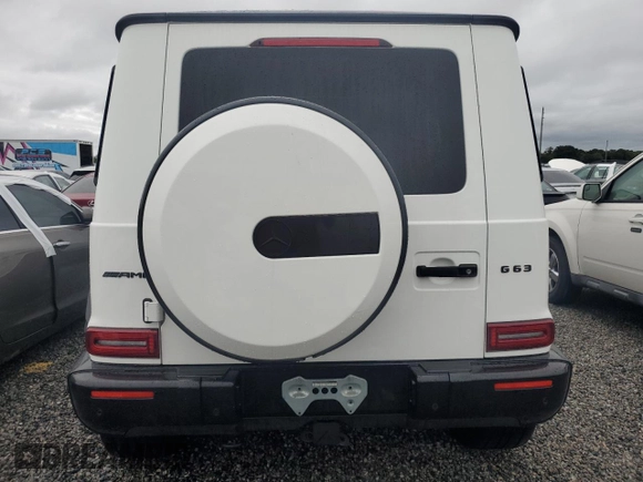 2021 Mercedes-Benz G 63 AMG z VIN W1NYC7HJXMX368367, wystawiony jako Copart lot #74120404 z przebiegiem 26 246 mil mil oraz Szkoda całkowita • Salvage title. Historia ofert i sprzedaży dostępna na DreamBid. Obrazek 6.