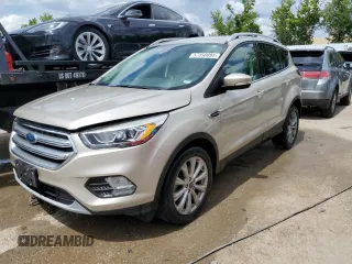 2017 Ford Escape Titanium with VIN 1FMCU0JD2HUE72414, listed as a Copart auction lot 57350094 with 55,077 mi miles and Salvage Title. Bid and sale history available at carsss.com. Image 1.