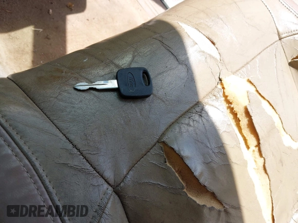 1999 Ford Explorer XL с VIN 1FMDU32E7XZC12721, выставлен на аукционе IAAI как лот 42093767 с пробегом 229 671 миль миль и . История ставок и продаж доступна на DreamBid. Изображение 11.