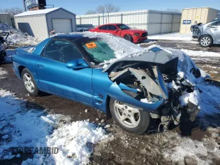 1999 Pontiac Firebird with VIN 2G2FS22K2X2206111, listed as a Copart auction lot 88034565 with 0 mi miles and Salvage Title. Bid and sale history available at carsss.com. Image 4.