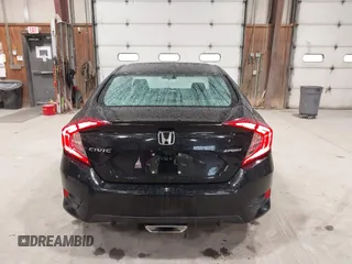2019 Honda Civic Sport with VIN 2HGFC2F89KH557466, listed as a IAAI auction lot 42335216 with 138,747 mi miles and . Bid and sale history available at DreamBid. Image 16.