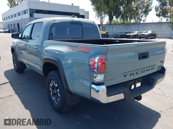 2023 Toyota Tacoma SR with VIN 3TMCZ5AN3PM590101, listed as a IAAI auction lot 42338670 with 12,970 mi miles and . Bid and sale history available at DreamBid. Image 3.