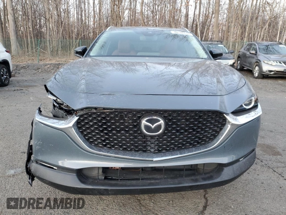 2023 Mazda CX-30 S Carbon Edition с VIN 3MVDMBCM3PM500403, выставлен на аукционе Copart как лот 88146095 с пробегом 29 861 миль миль и Списание • Salvage title. История ставок и продаж доступна на DreamBid. Изображение 5.