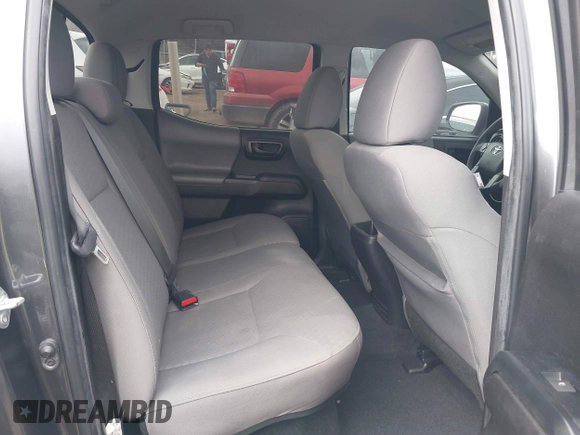 2023 Toyota Tacoma SR with VIN 3TYCZ5AN5PT138770, listed as a IAAI auction lot 41461423 with 19,785 mi miles and . Bid and sale history available at DreamBid. Image 8.