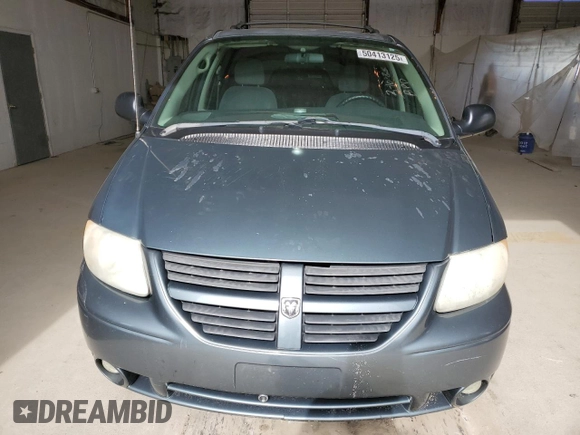 2005 Dodge Caravan SXT with VIN 2D4GP44L95R462451, listed as a Copart auction lot 50413125 with 148,573 mi miles and Salvage title. Bid and sale history available at DreamBid. Image 5.