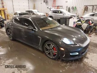 2012 Porsche Panamera Turbo z VIN WP0AC2A78CL090309, wystawiony jako IAAI lot #41597860 z przebiegiem 58 447 mil mil oraz . Historia ofert i sprzedaży dostępna na DreamBid. Obrazek 1.