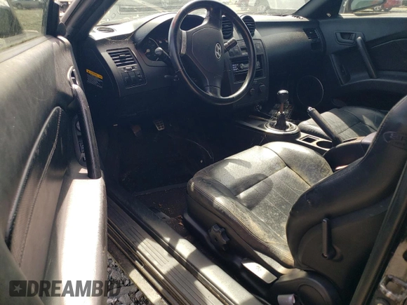 2003 Hyundai Tiburon GT z VIN KMHHN65F13U084620, wystawiony jako Copart lot #46880185 z przebiegiem Nie podano mil oraz Nie do naprawy • Non repairable. Historia ofert i sprzedaży dostępna na DreamBid. Obrazek 8.
