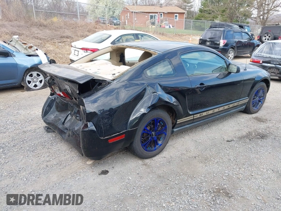 2006 Ford Mustang Standard with VIN 1ZVFT80N165264736, listed as a IAAI auction lot 41871329 with 144,304 mi miles. Bid and sale history available at carsss.com. Image 4.