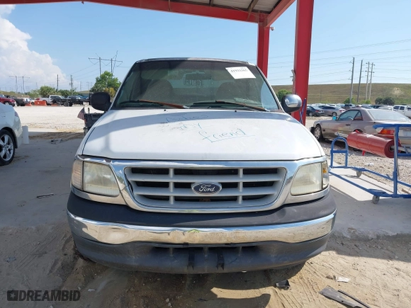 1999 Ford F-150 Work Series with VIN 1FTRX17W5XNB33627, listed as a IAAI auction lot 41933365 with 207,118 mi miles. Bid and sale history available at carsss.com. Image 6.